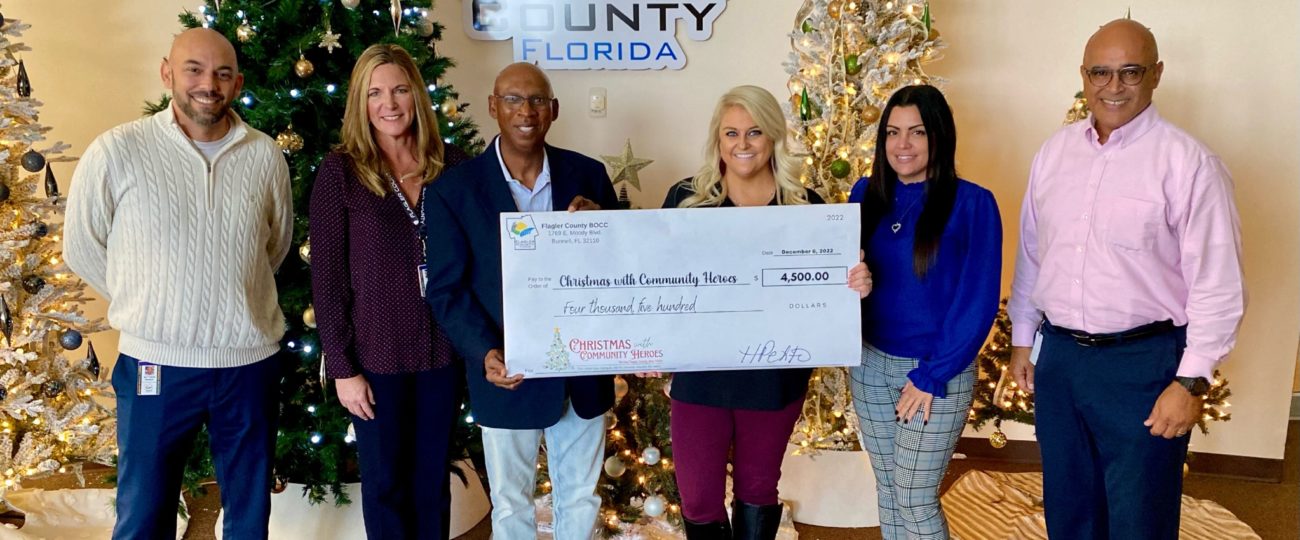 Flagler County staff raise $4,500 for ‘Christmas with Community Heroes’
