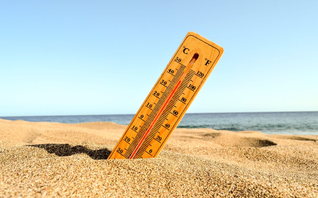 closeup shot thermometer beach sand scaled