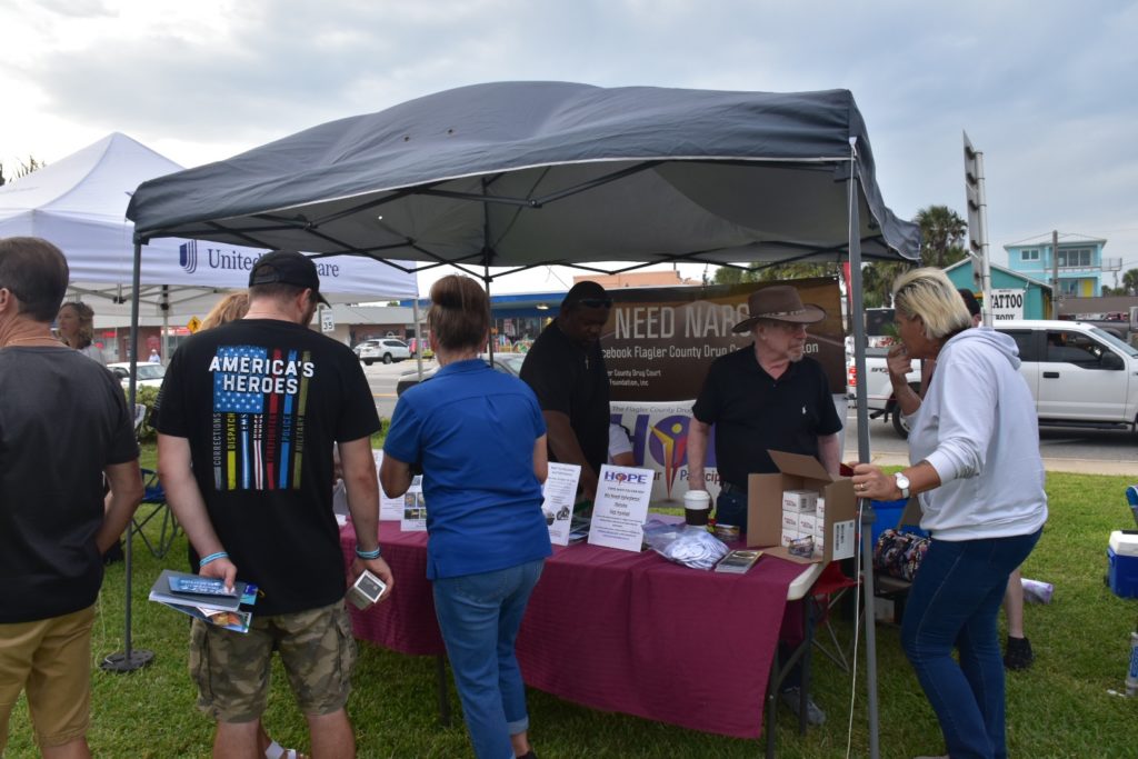 Flagler county drug court foundation booth at first friday