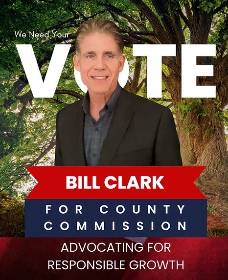 Campaign poster features Bill Clark for County Commission, with the slogan, "Advocating for Responsible Growth " The background shows a lush green forest with the large word "VOTE" prominently displayed Bill Clark is wearing a dark suit and smiling