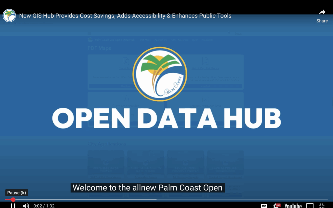 A blue screen displays the Palm Coast city logo above the words "OPEN DATA HUB " A video caption at the bottom reads, "Welcome to the all new Palm Coast Open