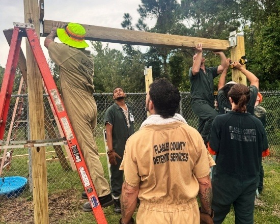 FCSO SMART Program Inmates Build Dog Shelters for Flagler Humane Society