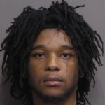 A man with a tear on his face