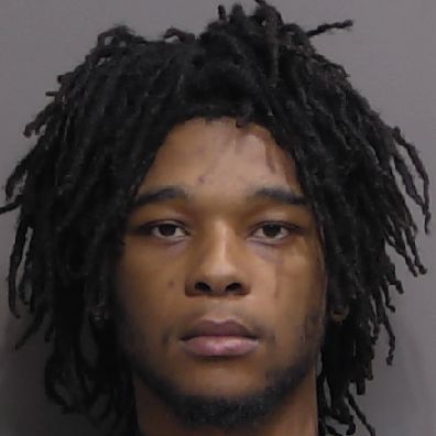 A man with a tear on his face