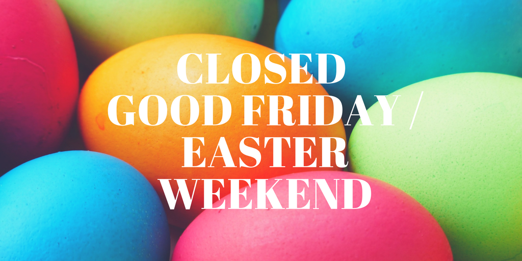Colorful Easter eggs with the message "Closed Good Friday / Easter Weekend" written in bold white letters over the eggs